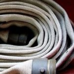 Coiled fire hose.