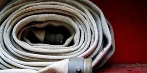 Coiled fire hose.
